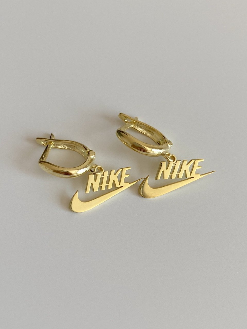 nike earrings silver